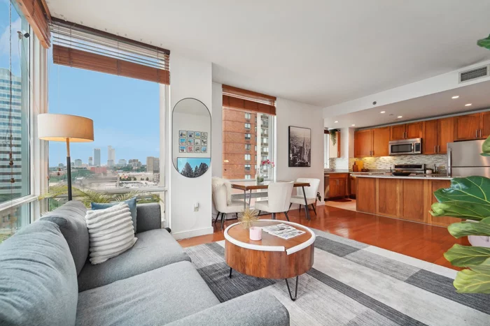 This south-facing corner unit on Newport Parkway boasts two bedrooms, two bathrooms, and a private balcony, offering views of the NYC skyline and the river. The multiple exposures and floor-to-ceiling windows fill the home with natural sunlight throughout the day, creating a warm and inviting atmosphere. The rare, windowed kitchen features granite countertops, stainless steel appliances, and an island with a breakfast bar, making it perfect for both everyday meals and entertaining. The spacious master bedroom includes two large walk-in closets and a luxurious en-suite bath with double vanities, providing ample storage and a touch of elegance. The second bedroom is equally well-appointed, offering comfort and functionality. Additional features include plentiful closets, hardwood floors throughout, central heating and air conditioning, and an in-unit washer/dryer, ensuring convenience and modern comfort. Residents of this premium building enjoy a host of top-notch amenities, including 24/7 concierge service, State-of-the-art fitness center, Jacuzzi, sauna, and steam room, Resident lounge and conference room, Playroom for children and Roof deck with panoramic NYC and river views, Experience the ultimate convenience of Newport! Conveniently located near Newport PATH, ferry services, and the light rail, commuting is effortless. The nearby Newport Mall offers a variety of shopping options, and an array of restaurants caters to every culinary preference. Newport Green Park is also within easy reach, providing a serene escape from the urban hustle. Experience the perfect blend of luxury, comfort, and convenience in this stunning 2-bedroom, 2-bathroom home. Contact us today to schedule a viewing!