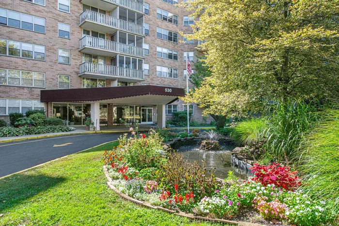 Upper Montclair at your fingertips! Enjoy spacious and serene condo living in this rare 3-bedroom, 2-bath corner unit overlooking the treetops on the 6th floor of The Bellaire House, near transportation, shopping, beautiful Anderson Park and much more.  An elevator building with NYC train and buses just blocks away, the pet-friendly Bellaire House features a private pool, shaded picnic tables, a BBQ area, a 24-hour concierge, and storage. Its location can't be beat for convenience - ACME supermarket is next door, CVS is across the street, and Upper Montclair's restaurant row is down the street! The unit - one of the few 3-bedroom condos in the building - boasts picture-frame molding wall details and ceiling medallions, a spacious living room with decorative fireplace and French doors with an eyebrow transom opening to a large enclosed balcony with custom blinds facing south and overlooking a green canopy of trees in summer. Enter the foyer with marble tile flooring, storage and a guest closet. A graceful archway leads into the open kitchen with backsplash and custom cabinets. The kitchen opens through another archway to the dining room, bathed in light from large windows and boasting crown molding and wood paneling. The sweeping, airy living room runs the width of the unit and has a fleur-de-lis arch leading to the private living quarters with 3 generous bedrooms, a full guest bath, storage, linen closet and an ensuite bath with shower in the primary bedroom.  Both outdoor parking and indoor parking are available. Unit is directly across from laundry on this floor. Maintenance fee includes heat, hot water, gas, use of pool, electric and building services. Don't miss this great opportunity to own in this prime location in Upper Montclair's premier condo community!