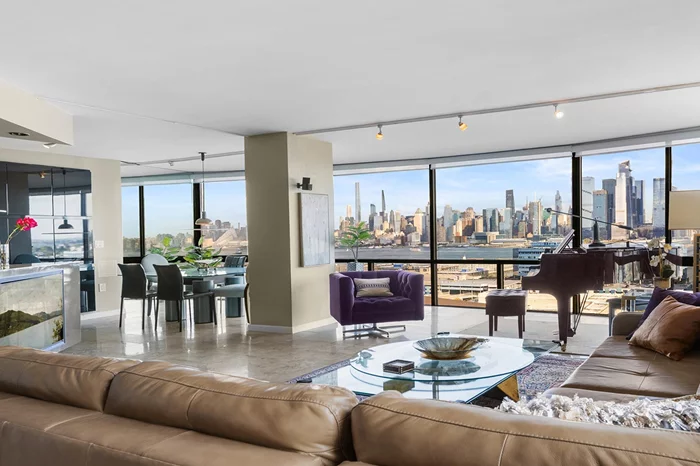 Stunning unit, fabulous NYC view! Open the door to your spacious new home; reward yourself and electrify your guests with a jaw-dropping panorama of the magnificent New York City skyline! From fiery sunset-lit Hudson Yards skyscrapers to the soothing magic of Manhattan twilight, the City is yours  from uptown Manhattan straight down to the Freedom Tower and NY Harbor beyond. Enjoy it all through a 26-foot wall of floor-to-ceiling windows in this loft-like, open concept home with vast living room and separate dining room area. A chic, wide-open architect-designed kitchen plays upon geometric angles and shapes, with handy hidden circular cabinet at its entry, built-in glass curio shelving, twin circular stainless sinks, generous stainless steel counters, double stainless oven,  dishwasher and minimalist custom cooktops with two new induction burners and two traditional electric burners, perfect for slow cooking or favorite traditional cookware. Endless mirror-like lacquer cabinets are nicely contrasted by elegant travertine tile floors throughout the entire living area. This unit features two upgraded bathrooms, seven closets, custom lighting, and built-in 48 TV with included home stereo surround speakers and hidden wiring. The second bedroom has been enlarged for greater diversity, and the primary bedroom suite is the largest in Troy Towers, with separate dressing area and 8-ft. by 4-ft. walk-in closet. Southern sunlight brightens your day throughout this coveted 04-line corner unit, the largest 2-bedroom, 2-bath floor plan in Troy Towers.  Maintenance includes real estate taxes, high-speed Internet, cable TV service including HBO and Showtime, and ALL utilities - central air, heat, water, and electricity. This pet-friendly West Hoboken luxury coop has on-site garage parking, readily available at $165/mo., bike storage for $120/year and fitness center membership is just $240/year. You'll find an Amazon hub, dry cleaning pickup service, laundry on every floor, and weekday rush hour buses to NYC and free morning PATH shuttles leaving from the front door. A 5-minute drive gets you to the Lincoln Tunnel, Hoboken, and waterfront restaurants. Parks and shopping are plentiful and nearby, many within walking distance.  Troy Towers is a well-built, well-maintained vintage hi-rise with an assessment-averse reputation, the best value and best world class NYC views on the Hudson. The building is undergoing budgeted upgrades of the elevators, lobby, and pool area with proposed build-out beneath to create exciting new building amenities in the coming years. (Note: Initial purchases must be owner-occupied for a minimum of two years. Square footage quotes are not provided by the building, so estimated quotes for similar units may be inconsistent or inaccurate. Please request original floor plans for comparisons.)