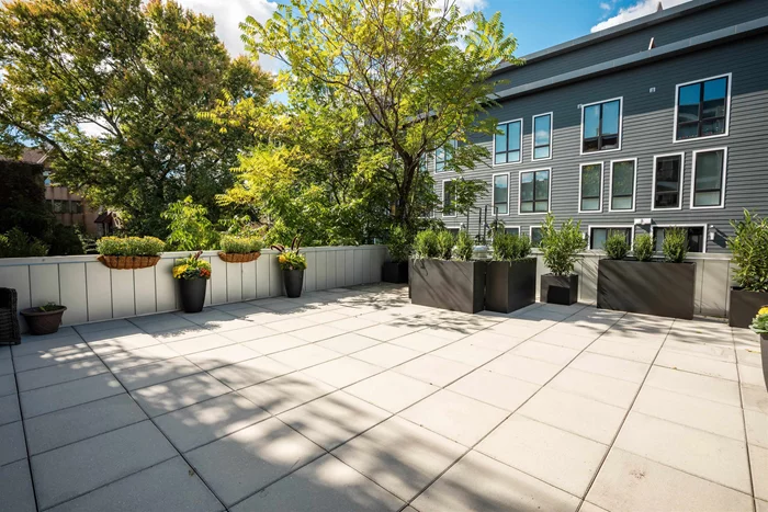 OPEN HOUSE SAT 10/26 & SUN 10/27 1-3PM | Indoor/Outdoor living at its finest! Introducing this expansive, beautifully upgraded 2 bedroom, 2 bathroom condo with show-stopping 800 square foot private terrace. Step inside to the sunlit, open living area featuring upgraded kitchen with wrap around breakfast bar, shaker cabinetry, quartz countertops, under counter microwave drawer and stainless steel appliance suite, room for dining and west-facing sliding doors that open to your own outdoor living space. Large primary bedroom boasts en-suite bathroom with double vanity, standing showing and soaking tub, huge walk-in closet, and sliding doors that open to Juliet balcony. The sizable second bedroom comes complete with a large closet and juliet balcony. Additional features include second full bathroom, hardwood flooring throughout, stacked full size washer/dryer, central A/C and parking available nearby. Excellent Southwest Hoboken location close to PATH, NJ Transit, NJ Turnpike, and the fabulous restaurants, shopping and nightlife Hoboken has to offer.