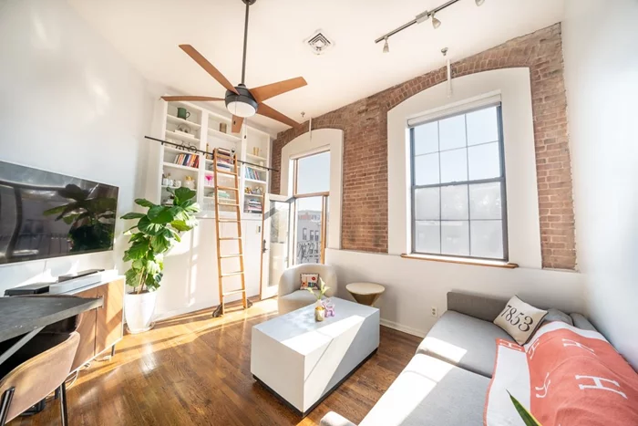 Welcome to 1015 Grand Street, Unit 3E, located on one of the last cobblestone streets left in beautiful tree-lined Hoboken! This wonderfully quiet brick building is as stunning to look at as to live in. Add in an elevator, deeded garage parking, and a private balcony and this one bedroom immediately becomes one of the most unique and valuable options on the market. Property Highlights:  Attached Garage Parking: Enjoy the luxury of secure, covered parking just an elevator ride away.  Private Balcony: Step outside and relax on your private balcony, ideal for morning coffee or evening sunsets.  Spacious 12-Foot Ceilings: An open, airy ambiance complements the home's layout.  South-Facing Windows: Bask in natural light all day, creating a bright and welcoming atmosphere. Need some darkness? The automatic shades add for easy convenience.  Brand New Central A/C & Heating 2024: Stay comfortable year-round with modern, efficient climate control.  Stylish, Newly Renovated Bathroom 2024: Freshly updated to elevate your daily routine. Hotel vibes!  Laundry Down the Hall: Skip the trips to the laundromat with convenient on-floor laundry facilities.  Pet Friendly: Bring your furry friends along; this condo is pet-friendly! Additional Details:  Low HOA: $375/month  Low Annual Property Tax: $6, 300 Steps away from Columbus Park, a stone's throw away from the bus to Port Authority, and surrounded by the best restaurants and shops that Uptown Hoboken has to offer, the location could not be better. Please stop by the Hive before or after visiting to find your new coffee shop/pastry place. Schedule your viewing today!