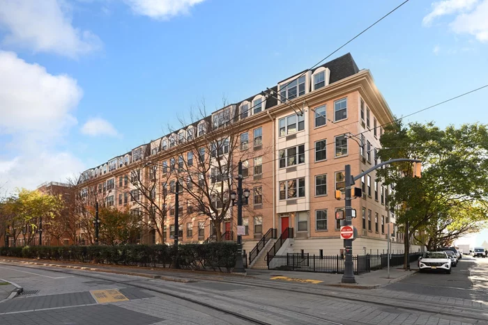 Experience luxury living in the heart of Historic Paulus Hook with this stunning 2-bedroom, 2-bathroom condominium. This residence offers modern convenience along with deeded oversized garage parking, 24-hour doorman service, a fully equipped gym, elevator and in-unit laundry. The kitchen boasts sleek white cabinetry, absolute black granite tops and stainless steel appliances that seamlessly flowing into a bright and spacious living room. With bedrooms situated at opposite ends, the layout is ideal for both daily living and entertaining. The primary bedroom features an ensuite bath with double vanities, a stylish shower and a walk-in closet. Residents also enjoy a welcoming concierge lobby, pet-friendly amenities and easy access to the best of city living. Located just moments from the PATH station, the JC waterfront, local shops and schools, this home offers the perfect balance of comfort, convenience and lifestyle in a vibrant historic neighborhood.