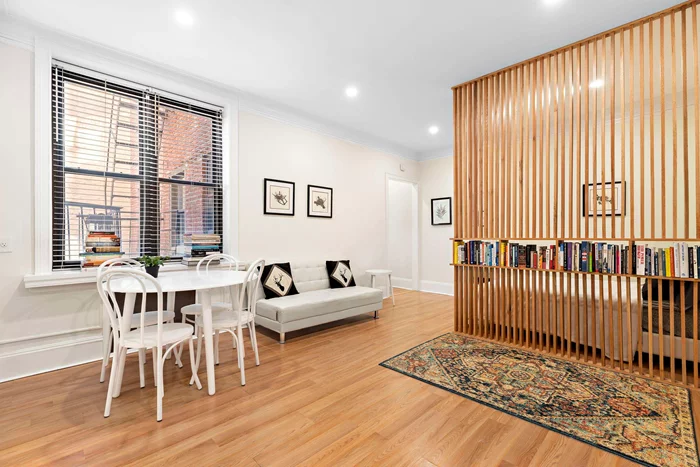 Fully renovated studio condo in a historic elevator building in prime uptown Hoboken. This quiet, sunlit unit features a custom-designed white oak divider and bookcase, and recessed lighting on dimmers and crown moldings, and was recently repainted. The kitchen has stainless steel counters, hexagonal floor tiles, and marble mosaic tile kitchen backsplash. The updated bathroom has floor to ceiling subway tile, glass shower partition, and polished chrome fixtures. The condo faces a quiet inner courtyard. Canterbury Courts, a Tudor-style historic elevator building, formerly a theater,  features an on-site super, a lobby with terracotta tiles,  and wood moldings, 3 common outdoor spaces, large laundry room and storage units available for rent. Heat and hot water are included in the monthly maintenance. In the heart of uptown Hoboken, with restaurants, nightlife, shopping, and an easy NYC commute with a NJ Transit bus stop right outside and close proximity to the Ferry, parks and waterfront.