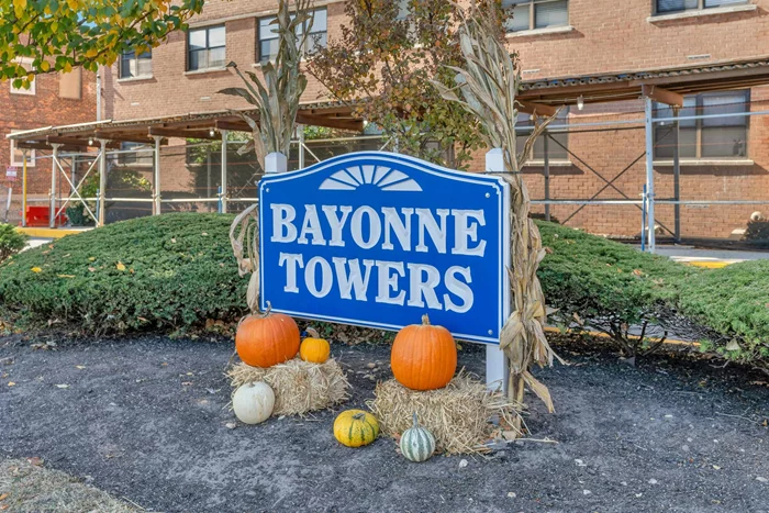 This stunning one-bedroom condo, situated on the 7th floor of Bayonne Towers in Bayonne's desirable uptown section, offers breathtaking NYC skyline views. The open-concept layout is complemented by newly installed hardwood floors throughout, while oversized windows fill the space with natural light, enhancing the stunning cityscape. The unit includes a dedicated parking spot, and the building boasts excellent amenities, including a sparkling pool and a well-maintained laundry room. Ideally located just minutes from the waterfront park and within close proximity to public transportation, shopping, and dining, this home offers the perfect combination of comfort and convenience. Best of all, it's only a quick 10-minute drive to the Holland Tunnel, ensuring easy access to NYC, local airports, and major highways. This condo is truly a gem, combining luxury and an unbeatable location!