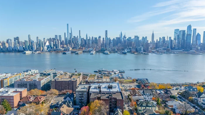 Welcome to your dream home on prestigious Boulevard East! This beautifully updated 2-bedroom, 1-bathroom condo offers breathtaking views of the New York City skyline and the Hudson River. Perched just two flights up, this charming unit boasts a renovated kitchen and bathroom, seamlessly blending modern comforts with the timeless appeal of exposed brick. Large windows flood the space with natural light, while the layout is perfect for both relaxation and entertaining. Convenience is at your doorstep with a bus stop right outside the building, providing an effortless commute to Manhattan. Whether you're enjoying the views from your living room and bedroom, taking a stroll along the scenic Boulevard East, or heading into the city, this location offers it all. Don't miss the chance to own this exceptional home in one of Weehawken's most desirable areas. Schedule your showing today and experience the perfect combination of style, convenience, and iconic views!