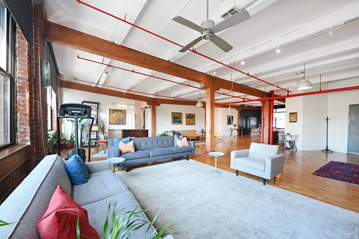 *** OPEN HOUSE 12/8 between 1-3 pm *** Rare and fabulous true loft living along the Palisades with one car deeded parking. This incredible 4220 square foot home boasts original hardwood floors, soaring 13 ft ceilings, exposed brick and beams and preserved industrial elements. Enter the unit through a keyed elevator and onto an expansive open floor plan bathed in light with large east and west facing windows, and winter views of NYC. With a Viking refrigerator, Thermador stove, granite countertops, large island and plenty of storage, cooking and entertaining are a dream. Currently used as a four bedroom with two full baths and two additional rooms for office/ gym and children's play space, the existing layout offers many configurations. An oversized pantry plus closets throughout provide a place for everything. Excellent access to the bus and tunnel makes commuting a breeze. Great walkable neighborhood just minutes from the Union City Reservoir Walk and bordering on Hoboken, and Jersey City for easy enjoyment of these communities as well.