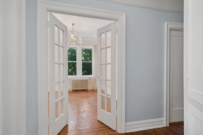 Welcome to 206 Jewett Avenue #44  a beautifully bright and airy two-bedroom, one-bath condominium located in Jersey City's vibrant McGinley Square and West Side neighborhoods. This charming home invites you in with its hardwood floors, high ceilings and classic moldings, giving it a sense of spaciousness and character. Natural light pours in through windows in every room, creating a warm and welcoming atmosphere in this freshly painted home. The floor plan allows for flexible living, with well-proportioned rooms perfect for both relaxation and entertaining and offers abundant closets. Enjoy the benefits of affordable HOA fees that include heat, hot water, on-site laundry, and a superintendent in the building, along with low taxes, making this home a truly budget-friendly option and an incredible value. This is a wonderful opportunity to bring your own personal style and make this space truly your own. Situated in a neighborhood known for its convenience, you'll find yourself moments away from local favorites such as the historic Lincoln Park, renowned for its lush greenery, sports facilities, and walking trails. The area offers a variety of cafes, eateries, and shops, including beloved spots like My Mexico, Snapdragon Coffee & Social and Harry's Daughter, where locals gather. For commuting, the Journal Square PATH station provides easy access to Manhattan and surrounding areas, NJ Transit Buses along JF Kennedy Boulevard are at the corner, while major highways to access Northern and Central New Jersey, and Downtown Jersey City and Hoboken are also just minutes away. Experience the blend of urban living and community charm at this delightful home on Jewett Avenue, where the best of Jersey City is right at your doorstep.