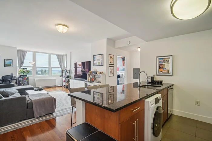 Location, location! Luxury living at 88 Morgan St. downtown Jersey City. In the middle of Exchange Place, with easy access to major highways to NJ and NYC. Living at 88 Morgan is the commuters' dream. This amazing 1 Bed/1 bath on the 44th floor has stunning views of Manhattan and Hudson River.  This well maintained unit is ideal for invester-it has a current tenant who d love to continue to rent. It features an open Chef's kitchen with Granite counters, a beautiful breakfast Bar, Custom Blinds, Fully Stacked Washer/dryer. Hardwood floors throughout. Enjoy all the amenities 88 Morgan can provide: Spa with jacuzzi, steam room, sauna, golf simulator, billiard room, media room, children/s ourdoor playground, table tennis, gym, business center, heated outdoor pool, cabanas and more! It has 24 -hour doorman as well as concierge and security. It is just steps away from Whole Foods, Restaurants, path, Light Rail, and top-rated PS 16 Elementary School.