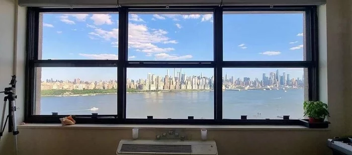 Gorgeous Panoramic Hudson River and Manhattan skyline view! ALL utilities are included! This rare, sunny, high-floor 1 bd, 1 bath apartment is located at the desirable Galaxy Towers. The spacious home is sure to please with a beautiful unobstructed river view through wall-to-wall windows and two cooling/heating zones in both the bedroom and living room. The apartment consists of a spacious living room and bedroom, a full bath, a renovated kitchen, and lots of closet space. Rent includes utilities and amenities - heat, water, hot water, gas, electricity, usage of outdoor and indoor pools, fitness center, game room, sauna, and tennis courts. The luxurious Galaxy Towers offers 24/7 concierge, security, shops, restaurants and EV charging station on-site. Garage parking is available for a fee. Pets on a case by case. Perfect location, close to parks, restaurants, shops, and a river boardwalk. Direct transportation to Manhattan apx. 25-minute bus ride or via free shuttle to ferry, as well as convenient connection to NJ major highways