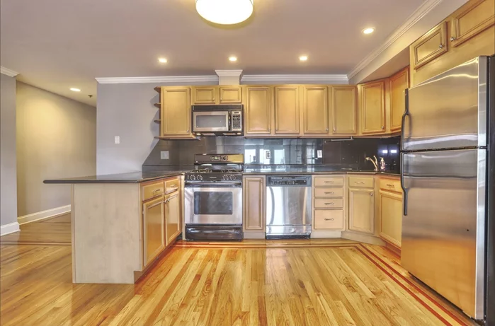 Welcome home to this beautiful 3 bedroom 2 bath home overlooking NYC. Apartment features hardwood floors, stainless steel appliances, in unit laundry and 1 car parking included! Private balcony with unobstructed views. Close to parks, shops, restaurants, bus stops, and a very short distance into Hoboken!