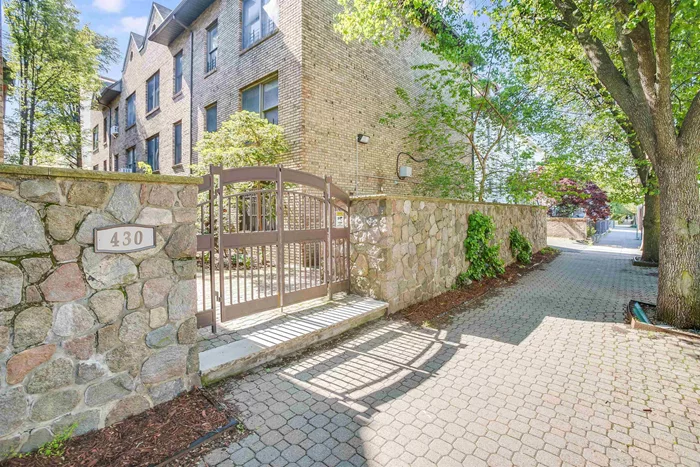 It is finally here.. the sought after home you have been searching for in the location you desire! Fall in love with this approx 1900 sq ft PRIVATE TOWNHOME with a 1 family feel that rivals any suburban home. Amazing Freedom Tower NYC views, beautiful, gated courtyard and your very own private garage parking on sought after Ogden Ave! Everything you have been searching for and more with 3 bed / 2 full bath / 1 half bath of spectacular living. This home checks all the boxes and is ideal for entertaining or a growing family. Grand open floor plan with large living area which flows seamlessly into the spacious dining area. Well laid out and sun-filled eat-in kitchen with sliding glass doors leads to a private deck which is the perfect spot to sip your morning coffee. Enjoy the Freedom Tower NYC views from your very own rooftop solarium, a perfect space for relaxing or gathering with friends and family. Extra family room / office area and laundry room when you enter. Plenty of room for multiple people to work from a home office and have privacy. This coveted home easily parks 2 cars has a spacious private garage for parking and storage. Must see to believe with central air & HWF. Common gated courtyard and entrance with picnic area, play area and garden. Location! Location! Vibrant community with Riverview Fisk Park, farmers market, cool coffee shops & restaurants in easy walking distance. Commuters dream.. steps to the direct bus to Port Authority and Hoboken 9th Street Light Rail elevator. Don't miss out!