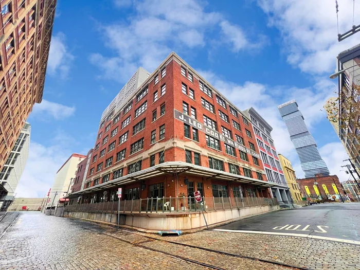 Discover the potential of this industrial-style Certified Artist Loft in the sought-after Cooke Lofts. Located in the vibrant Powerhouse Arts District of Downtown Jersey City, this spacious one-bedroom condominium boasts high ceilings, concrete flooring, central air, and an open-concept layout. This is a blank canvas for your creative vision. With large South-facing windows, natural light floods the space, highlighting its raw industrial charm. This beauty is in need of renovations, making it a perfect opportunity to customize your dream loft. Enjoy the convenience of a package room and a shared rooftop deck with breathtaking views. Ideally situated near shopping, dining, top-rated schools, and multiple transit options, your travel options are unlimited. The waterfront is a stroll away, offering scenic walks and stunning skyline views. Don't miss this rare chance to create your ideal urban retreat in one of Jersey City's most dynamic neighborhoods! Schedule a viewing today.  **Income restrictions apply and potential buyers must have a valid Certified Artist status on file with an Artist Certification Agency, owner occupants only.