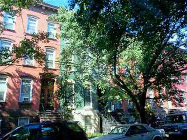 A SUN DRENCHED UNIT WITH OLD WORLD CHARM PLUS 2 WORKING MARBLE FIREPLACES HI CEILINGS, DINING ROOM WITH FRENCH DOORS, UPDATED KIT AND BATH, LARGE BED PLUS DEN CAN BE USED AS 2ND BED, FREE LAUNDRY IN BASEMENT AND STORAGE, A RARE FIND IN A BROWNSTONE.