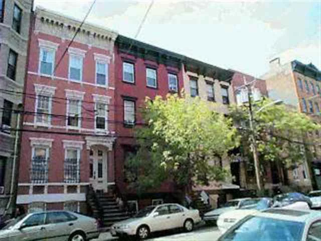 LOTS OF CHARM IN THIS 1.5 BEDROOM. 2ND BEDROOM PERFECT FOR NURSERY OFFICE. PERIOD DETAILS, 10.5 FOOT CEILING, ORIGINAL MOLDINGS, 1920S LIGHT FIXTURES, STAINED GLASS, EXPOSED BRICK, TIN CEILINGS AND MORE. QUIET BUILDING, BUS TO NYC ON CORNERM, W D IN UNIT. HURRY.COMMON AREA AND HALLWAYS TO BE REPAINTED AND NEW LIGHT FIXTURES ADDED.
