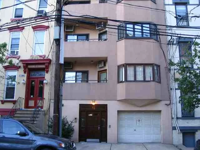 UNIQUE DUPLEX PENTHOUSE W 2 TERRACES IN 8 UNIT ELEVATOR BUILDING. AIRY 2BR, 2 BATH W GLASS BLOCK, HARDWOOD FLOORS, LIVING ROOM W DRAMATIC 20FT WINDOW WALL CEILING. SHORT DOWNTOWN WALK TO PATH, TRAINS, BUS, FERRY, DEEDED PARKING IN SECURE GARAGE BENEATH BUILDING.