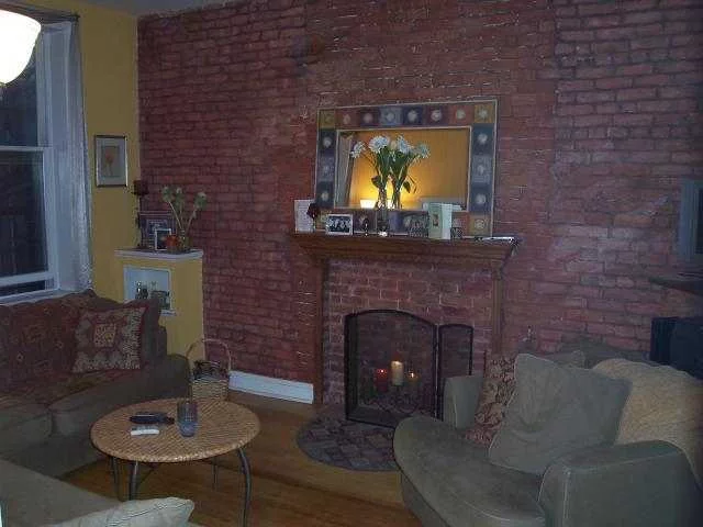 WELCOME HOME TO THIS COZY CONDO FEATURING EXPOSED BRICK & ORNAMENTAL FIREPLACE, BUILTIN SHELVING IN WIRING ROOM, GLASS BLOCK WINDOW IN BEDROOM W/NICE CLOSET & STORAGE SPACE. TOP FLOOR UNIT W/SKYLITE. ENTRY FOYER WITH ALCOVE FOR THE OFFICE OR DEN. CONDO IS LOCATED IN BACK OF BUILDING FACING LANDSCAPED COMMON BACKYARD.