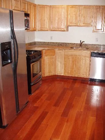 This brand new 2bed/2bath condo boasts hardwood floors, central air, granite countertops, custom cabinetry, stainless steel appliances, Jacuzzi tub, granite floors in both baths, and washer/dryer in the unit. One deeded garage parking spot included in the price. The building is located 1.5 blocks from NYC transport. Eligible for 5 year tax abatement.