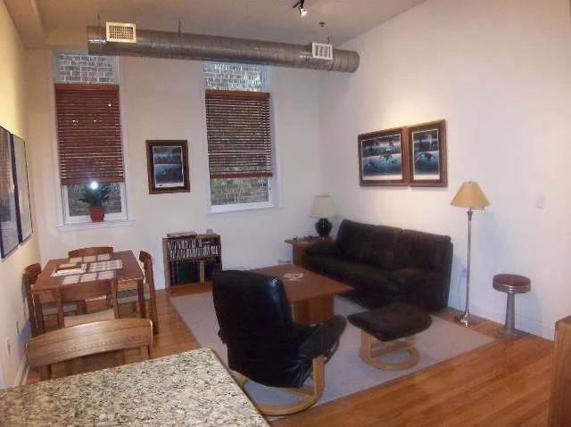 PRICE IMPROVEMENT!! Rare Uptown 2 Bedroom / 2 bath LOFT CONDO w/13 ft soaring ceilings & Huge windows. Exposed Brick & A/C ductwork, custom lofted storage closets and Storage in Garage. Open style Maple kitchen w/Granite Breakfast Bar & stainless steel Appliances. Lge Tumbled tile Bathrooms. Owner has transferable rental parking nearby on 8th & Jeff. Large common courtyard w/tables & Chairs. Quiet rear . Convenient elevator Bldg. $1000 Bonus to selling broker.
