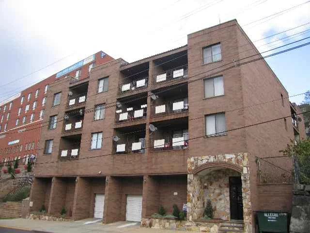Spacious & well maintained 1 bdrm unit in modern elevator bldg w deeded pkg. Excellent location overlooking the meadowlands. Sliders in LR lead to terrace. Laundry facility on each floor. New H/W.
