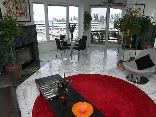 AT RIVA POINTE EVERYDAY FEELS LIKE A LUXURIOUS CRUISE VACATION. HIGHLY DESIRED & RARELY OFFERED 2 BDRM, 3.5 BTH DUPLEX PENTHOUSE W/ OUTDOOR TERRACE SITUATED ON A PIER OVERLOOKING MARINA. GREAT VIEWS OF HUDSON RIVER & MIDTOWN MANHATTAN NORTH TO THE GWB. DELUXE FEATURES INCL. FIREPLACE, LG. WINDOWS, FRESH PAINT & CARPET. ITALIAN TILE IN LR/DR & KITCHEN IS ELEGANT. 24 HR CONCIERGE, FITNESS CNTR & INDOOR POOL. RESERVED PARKING INCL. NY FERRY TO MANHATTAN & NJ TRANSIT STOP ON SITE. LIGHT RAIL ACROSS STREET.