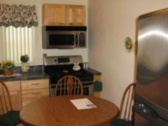 Fabulous garden apt. This corner unit features E.I.K. with ss appliances, beautiful refinished h/w floors in bedroom & parking space! Bus transportation at door! 10 min walk to train! Close to major highway Rt. 17. Great for first time home buyer!