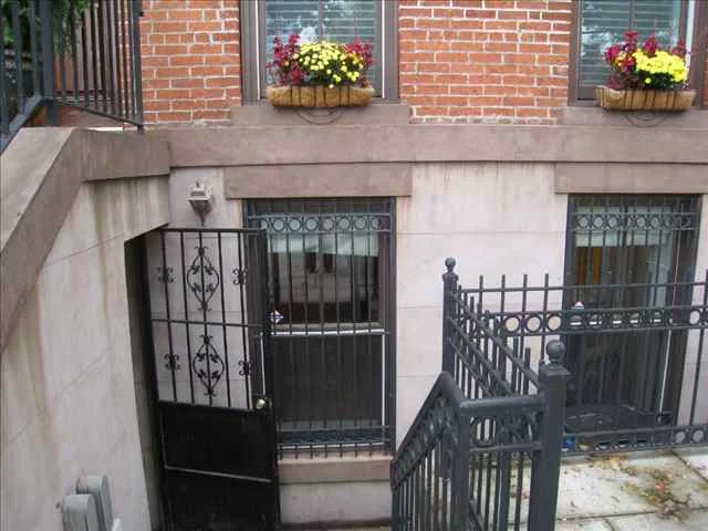 Cozy, 869 sq ft , 2 bedroom condo in the heart of prestigious Jersey City downtown.Unit features all tile floors through out, renovated bathroom, updated kitchen with breakfast bar and good size livingroom.Both bedrooms have an acess to a nice size backyard, great for enetertainment.Unit also has Central A/C and Washer/Dryer. Walking distance to Grove Street Path, shops , most of Downtown's best restaurants and bars.Must See!