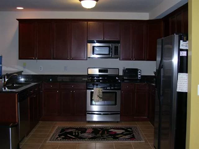 Fantastic 1yr old luxury condo in elevator building. 3 Bedrooms plus den/office, 2 Full Baths w/ Jacuzzi in Master Bath, lots of closets, central A/C, W/D in unit, gorgeous hardwood floors throughout, incredible kitchen w/ lots of cabinets, and granite countertops. Includes indoor deeded parking space. Very convenient to all major transportation as well as a health club across the street ($97 a month) with a heated indoor pool.