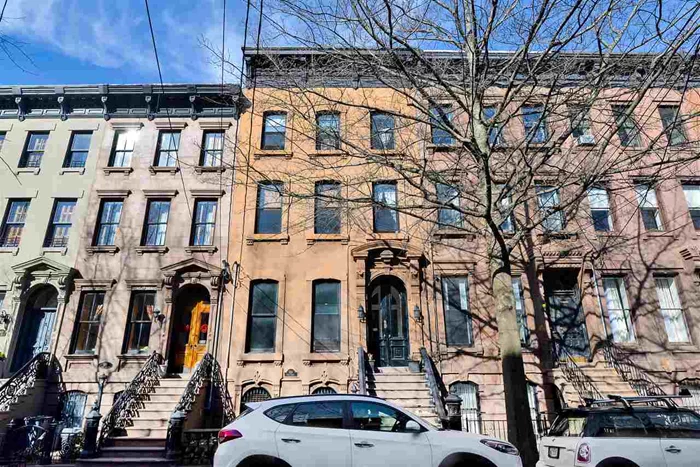 Magnificent 3 family brownstone in Jersey City Downtown, Historic Van Vorst Park. Lots of beauty and details of her past plus the highest grade modern amenities. It has 6 Bedrooms and 4 full baths. Owners duplex features 2 Br 2 Baths with private yard. Must see to appreciate the work and detail, from the gradeur of the parlor level living quarters to the Italian European custom designed industrial grade kitchen and so much more.