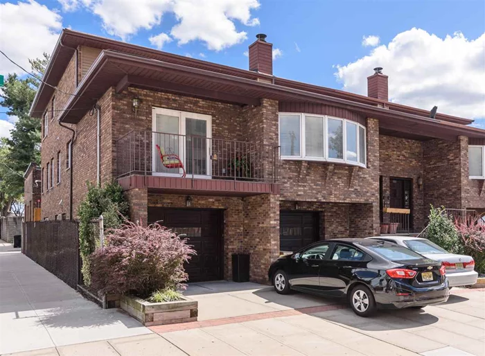 Welcome home to this massive and solid all brick three family home located in one of Union City's prettiest residential areas. Close to NYC transportation and major roadways. Stroll to many of the boutique shops and eateries on Bergenline Avenue. Steps to one of UC's Blue-Ribbon Schools. This is a wide 38 x 73 three family home with oversized floor plans on every level. Each unit boasts hardwood floors, Eat-in-kitchens, and Laundry on all levels. Two handsome stone hearth wood-burning fireplaces in two units. All units offer private outdoor patio or balconies. Two oversized garages plus additional parking in the driveway. Many closets and storage throughout. A brand NEW roof and well maintained updated utilities. This home is a perfect situation for larger families or investors with a great rent roll potential. Lovely curb-appeal. Built in 1983 This home is surely not one to miss!