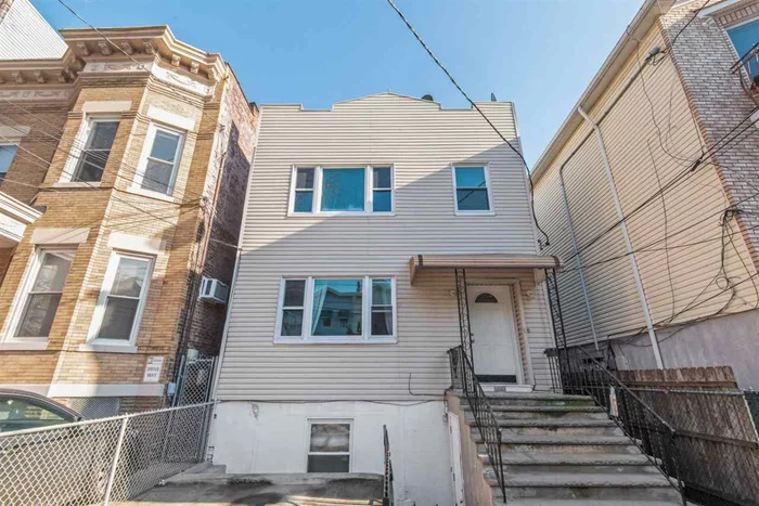 Located in the heart of the booming Jersey City Heights, sits this amazing investment opportunity. This turn key investment provides immediate rental income. whether your looking to invest or reside in this property, it is an all around great deal. With a few minor improvements, the rental value on this property can be exponentially increased. Just when you thought this property has it all, don't forget about the spacious yard and parking spot.
