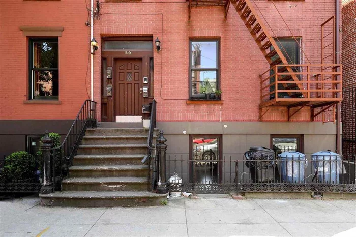 Fantastic Location....check! Great investment opportunity....check! Looking for the right building to build your custom 1 or 2 family home....check! Located just around the corner from the Grove street path and all that downtown Jersey City has to offer with restaurants, bars, shopping etc, 59 Wayne Street is the perfect investment. This 4 family row house is on a 25 x 100 lot. Currently all units are junior 1 bedrooms and await a rear extension to make into large 2 to 3 bedroom homes great for rentals, convert to condos or build that custom home you desire. The fire escape on the front of the building can be removed. Opportunities like this don't come often so don't miss out!