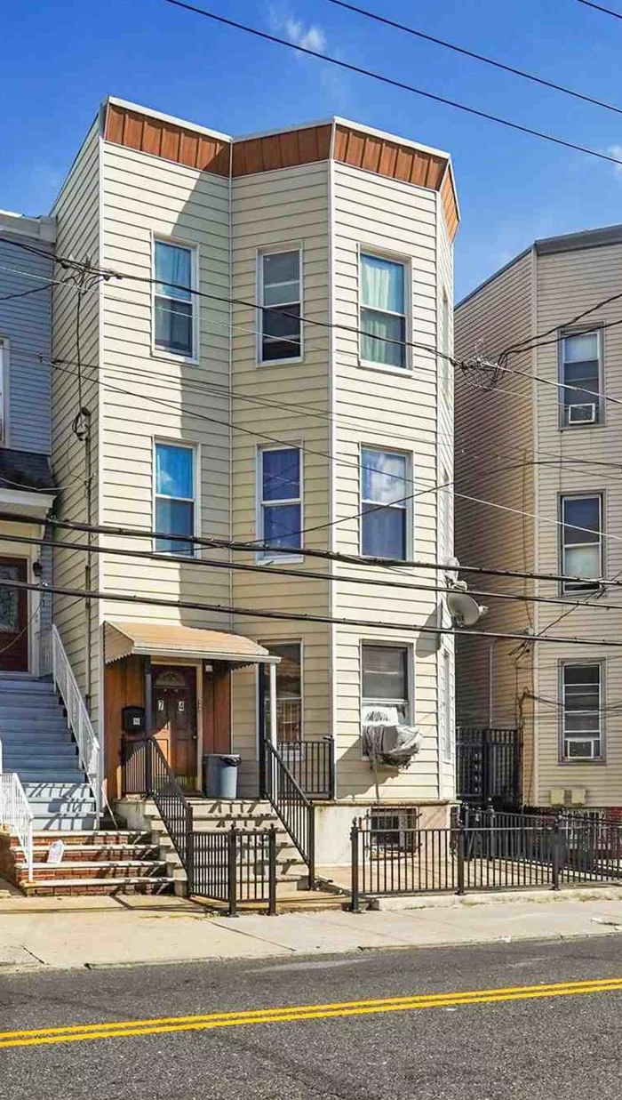 A family owned 3 family property for over 60 years in the heart of McGinley Square.  Located up the hill from downtown Jersey City, between Montgomery and Mercer, with excellent public transportation. The area has lots of authentic restaurants, parks, shops and history. Only a few blocks away from the the Path Trains at Journal Square. An investment property you don't want to pass up!