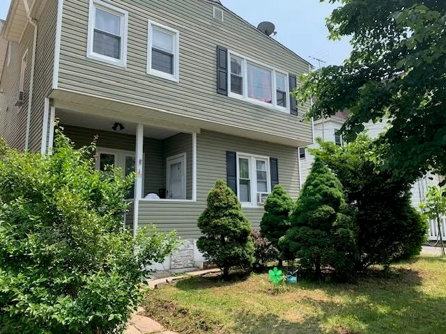 3-unit investment building in a prime location near downtown Elizabeth. The first floor comprises two units, each featuring 1 bedroom and 1 bathroom, while the second floor boasts a spacious unit with 3 bedrooms and 2 bathrooms. The property offers a large driveway leading to the backyard, where you'll find three garages and a shed, providing ample parking and storage options. One of the units (Unit 1) is currently occupied on a month-to-month basis, offering an immediate rental income opportunity. The building's utilities are all separated, which is a significant advantage for managing expenses. The property's location is highly convenient, being close to NYC train access, making commuting to the city easy, and in the proximity to Trinitas medical center. The property is being sold as-is. With its flexible configuration, this investment building presents intriguing possibilities - occupy the 3-bedroom unit (Unit 3) while renting out the two units on the first floor, generating rental income to offset your own housing costs and build equity in the property.