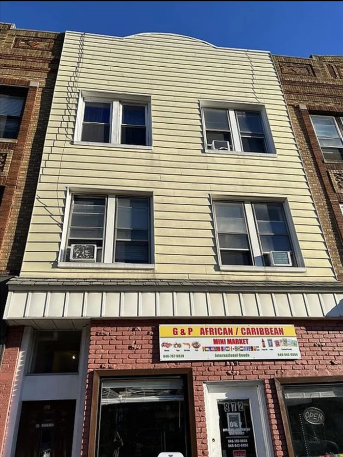 This enticing mixed-use investment property in Bayonne boasts two spacious 3-bedroom apartments, both with a large balcony and backyard. First floor consists of 1, 100 Sq Ft Storefront Situated on the prime block of Broadway, it offers convenient proximity to NYC, making it an appealing opportunity for investors looking to capitalize on Bayonne's thriving real estate market. 872 Broadway presents a lucrative opportunity with a prime location, ideal for prospective buyers looking for both residential and commercial income streams.