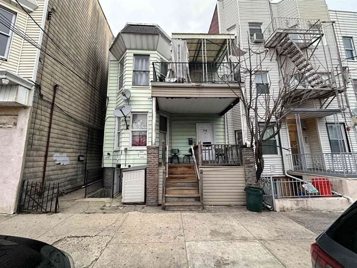 Great Investment opportunity with tons of upside. Get income from 3 family, and 1 detached single family unit in the back and an adjacent lot or bring your vision to build, plenty of potential. Separate electric, gas and tankless water heaters. Located near NYC transportation, shopping and schools. Property will not be delivered vacant.