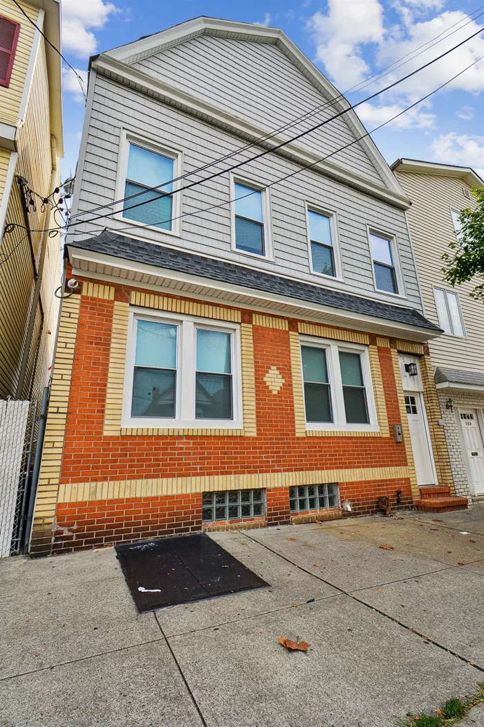 Total Gross Income: $93, 420/year. This fully Gut Renovated 4Family in the heart of Bayonne NJ, is already set up to enjoy a marvelous very healthy income production. All meters & water heaters are separate. Basement has a sump pump. Shared laundry is also in the basement. Property has been renovated with all new stairs, new kitchens, new bathrooms, & new roof! All 4 units have a Video Security Intercom. There are 4 Security Cameras surrounding property. This is for the buyer who wants cash flow at closing! No maintenance problems. It's 2 floors total, plus basement. Each floor has 2 units. Each unit is 2bed/1bath. All fixtures are exact same in all the units. (Unit #1 is 522sqft = $1, 850/mo) (Unit #2 is 507sqft = $1, 850/mo) (Unit #3 is 592sqft = $1, 925/mo) (Unit #4 is 674sqft = $2, 000/mo). Plus each unit pays $40/mo for internet. Attached is the rent roll, floor plan, along with full disclosure about the property. The Light Rail Station is 3 blocks away. Seller has Real Estate License.