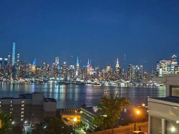 Discover a unique, exceptional opportunity to own an extraordinary 3-family property that boasts spectacular, direct $2 million dollar views of the iconic NYC/midtown Manhattan skyline.  Perfect for the discerning buyer, investor or visionary builder, this property offers remarkable possibilities to transform it into a truly magnificent trophy residence or a highly lucrative investment. Perched high above the waterfront on famed Blvd East, it spans approx 3, 300 SF of living space, plus an extra 800 SF of finished Lower Level space for a total of approx 4, 000 SF across four levels. Separate gas/heat/electric for all 3 units, 1 water meter, and washer/dryer in each unit. 4.5 Baths, & 7 BRs, plus 1 more BR in the LL. The expansive 1st Fl/LL duplex has an attached garage & SGD to rear patio. No tenants, just Seller residing in one unit, and to be delivered fully vacant. Although it needs work, this 3-family property w/ approx 4, 000 SF, spectacular views from each unit, & prime location represents a rare opportunity for those w/ the vision to unlock its full potential & transform it into something truly extraordinary.