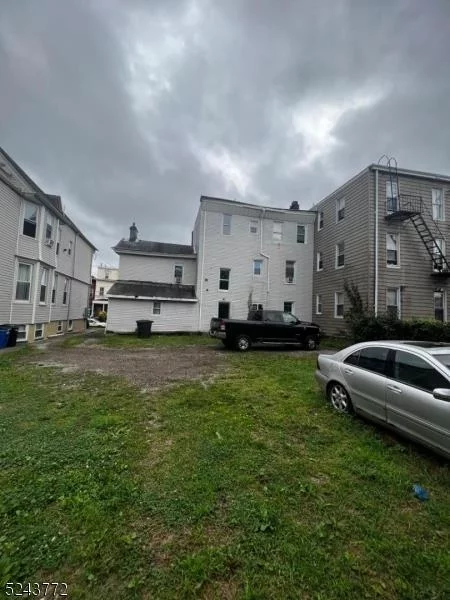 4 Family Apt building with land to built multi Units - Zoned R3. Please look at the Attached Document from zoning Division of Jersey City. Very close to City Hall and shopping centers. large Lot (56.50 x 108.25 ) for development opportunity.