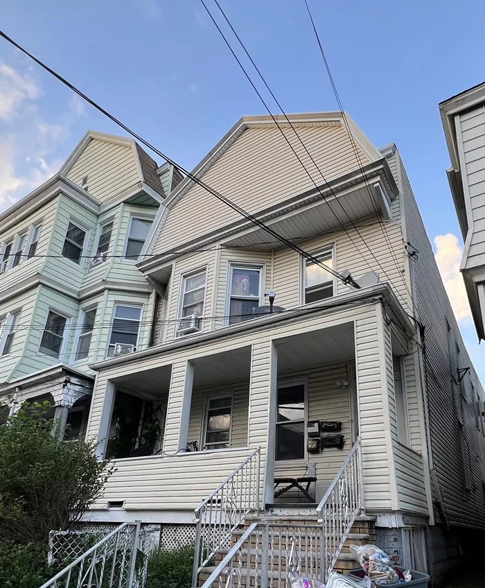 Introducing 95 W 17th St, ready for Owner-Occupied or Investors! This legal 4-family home with 3 units has been redone. Unit 1 comes with 2 Bedrooms, Living Room, and 1 Bath. Unit 2, 3, and 4 comes with 2 Bedrooms plus a Bonus room that could be used as a Living Room or office, and 1 Bath. Each floor with 2 units and a walk-out from the basement to the private backyard. Possible driveway in front of the home for 2 cars(Need approval from the township). The home in the heart of Bayonne! There are 5 electrical and gas meters for the entire home. This is truly a great investment home to live in a unit and rent out the rest or rent out the entire home. Right off the Kennedy Blvd, this home is close by G. Thomas DiDomenico 16th Street Park. Don't miss this opportunity. one unit could be delivered vacant. Tenants are month to month!