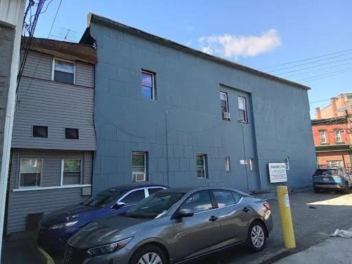 Great investment opportunity! Money producing 3 family located in an upcoming location in Greenville Jersey City with room for upside! Currently set up as 2 units on the first floor, front and back, with a 3rd unit on the entire 2nd floor. Unit 1 front - features one bedroom, one bath with open kitchen/living room. Unit 2 rear features - 2 bedrooms, 1 full bath with 3 entrances, nice size living room, dining room and kitchen. Unit 3 on 2nd floor - features 3 bedrooms, 1 room used as a hallway with closets, an additional storage room which can be converted to a 4th bedroom, 1 bath, kitchen and living room. unfinished basement with full height ceilings. Heat, hot water and electric are paid by the tenants. Great commuter location with a bus stop at your door step. Next to Danforth Ave. shopping, schools and much more!