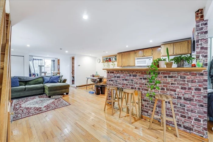 A fantastic opportunity to own a great investment! Fully-rented, bright, modern 3-family with 2-car parking, a large garden & fenced-in yard! A rare find - this conveniently located multi is located right off Palisade Avenue in the desirable West-Hoboken neighborhood of Union City! Situated on a 25 x 100' lot, 318 6TH Street is a stand-alone property containing thoughtfully-designed, sunny units, all with private entrances, access to the yard & garden  and separate utilities! Unit 1 is a spacious duplex consisting of an open-plan ground floor complete with lofty living-dining room, kitchen & full bath with sliders to a peaceful, meditative deck and garden. Upstairs, the Unit 1 duplex offers 2 lofty bedrooms, a 2nd full bath, and a washer-dryer area. Unit 2 includes 2 bedrooms & an open-plan living-dining room, kitchen, and a washer-dryer in the unit. The 3rd unit is a duplex-studio cottage - nestled in the back of the garden. The cottage is a magical & unique space with an eat-in kitchen & windowed bath on the first floor w/stairs leading up to the light-filled living room/bedroom area. All units offer recessed lighting, hardwood flooring, jacuzzis & wall air-conditioners! Amenities abound and are close by including: Firefighters Memorial Swimming Park w/views of Manhattan, Washington Park w/dog run, playground, splash pool, baseball, tennis, basketball & 4 miles of walking-jogging-biking trails! Fantastic restaurants, bars, live music, bakeries & shopping are close by! including: Fox & Crow, Aldys, Chofi Birria, Low Fidelity, The Alps, Playa Bowls, Fork Hill Kitchen, Bread & Salt, Andrea Salumeria & more! Transportation to NY is easy, accessible & fast! Including the 9th Street Light Rail, Palisade Bus Service, The PATH & The Hudson River Ferries. Don't miss out on this amazing property!