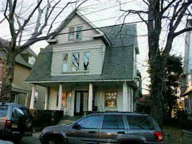 WEEHAWKEN 3 FAMILY. GRAND HOME ON 50X100 LOT IN KINGS BLUFF W LOTS OF ORIGINAL WOOD DETAIL AND STAIN GLASS WINDOWS, HWFS NICE SIZE ROOMS, GREAT FOR INVESTMENT OR TO LIVING. FIRST FLOOR TO BE DELIVERED VACANT W ENTRANCE TO DECK IN YARD, 2 CAR GARAGE, 3 SEPERATE GAS FURNANCE, HIGH BASEMENT. FRONT PORCH. BEST LOCATION, STEPS TO BLVD EAST.