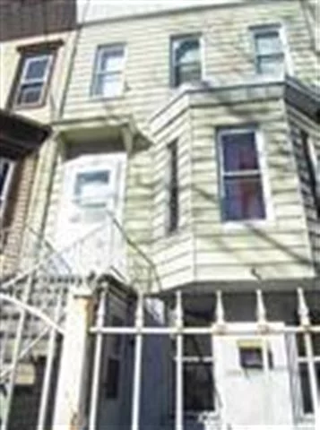 SHORT SALE....2 family home in Bergen-Lafayette section of Jersey City. Close to Liberty State Park, Light rail and buses. Needs total rehab.....