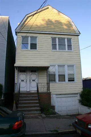 Great two family house located on Manhattan Avenue in Jersey City Western Slopes area. House has been recently renovated. First floor apartment, 2b/1ba comes equipped with brand new flooring, granite counter tops, renovated kitchen and walking in closet. 2nd floor apartment, 3b/1b comes equipped with brand new hardwood flooring, granite counter tops, renovated kitchen and walking in closet. Garage parking could fit 5 - 6 cars. Close to school, parks and public transportation