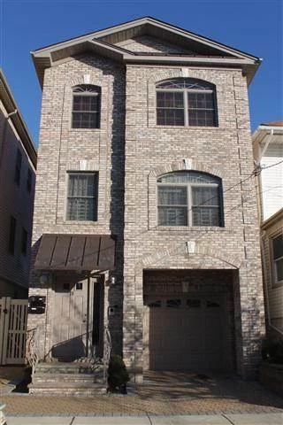 Great opportunity to purchase a newer construction two family home in the Heights with garage parking and yard. Both units have terraces, hardwood floors throughout and fully equipped granite and stainless steel kitchens. Washer & dryer hook-ups. High end finishes. Top floor has vaulted ceilings and skylights. 3960 SqFt total.