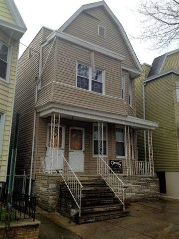 Great opportunity to renovate this gutted 2 family home. New windows & new separate heat. Call today!!