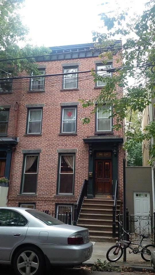 Semi attached, four stories brownstone located in a highly desirable historical downtown. One block from Hamilton Park. Owner's unit tastefully renovated kitchen and bath. Spacious and tranquil backyard. Exposed brick walls, exposed beams and much more. Close proximity to shops, mall, restaurants, school and PATH train to NYC.