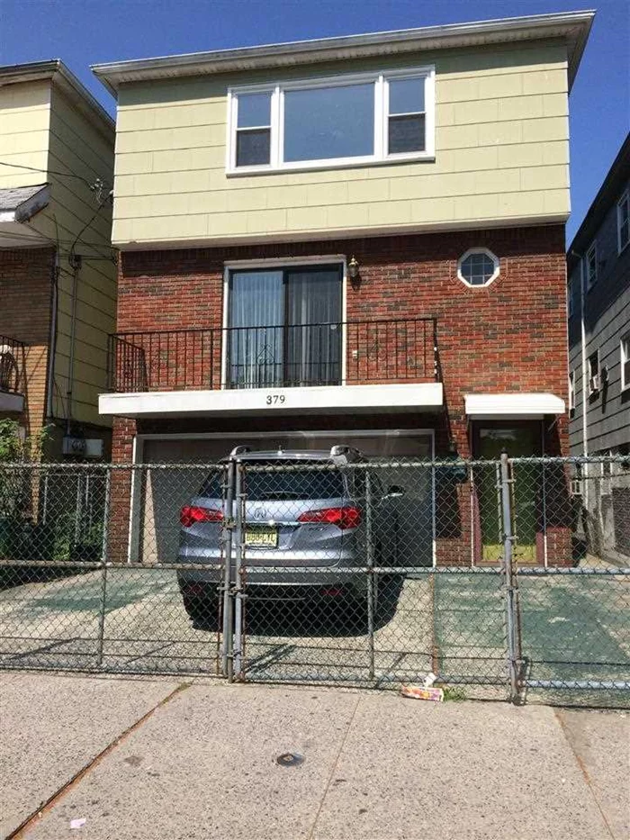 3 Family home in downtown Jersey City, near Grove Path station, NJ Light Rail, NYC Ferry, shops, restaurants and parks. This home has a relaxing balcony and a spacious backyard great for entertaining friends. Parking for 4 cars.