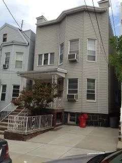 2 Family off Blvd East. Both apts have 3 BRs, large LRs, & DRs, plus Eat-In-Kitchen. 2nd floor has extra side room, 1 car parking space in front, nice size backyard, full unfinished bsmnt w/back staircase from bsmnt to 2nd floor apts. Needs TLC & updating & renovations. Easy commute to NYC, Hoboken, & Jersey City via free shuttle bus to light rail, ferry, jitney buses, NJ Transit buses at corner of Blvd East or Park Ave. Very close to Pathmark shopping Ctr. & shops, post office, restaurants, & schools.