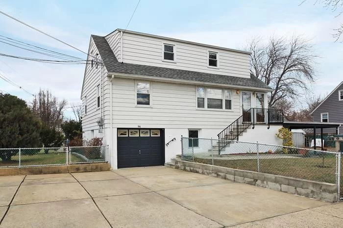 Great 2 family home in corner lot. First unit features eat in kitchen, living room, full bathroom plus 2 bedrooms. Second unit has same exact layout as unit 1. Baseboard heat, new stoves which are electric. Both units have D/W, hard wood floors. There are 5 parking spots and a backyard. House has bonus in-law suite on street level.